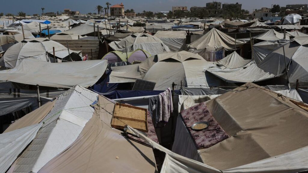 A tent camp where displaced Palestinian mother Iman Abdel Halim Abu Mutlaq shelters with her twin sons Uday and Hamza Abu Odah and her other children, in Mawasi area, in Khan Younis in the southern Gaza Strip, September 18, 2025. | Photo Credit: Reuters