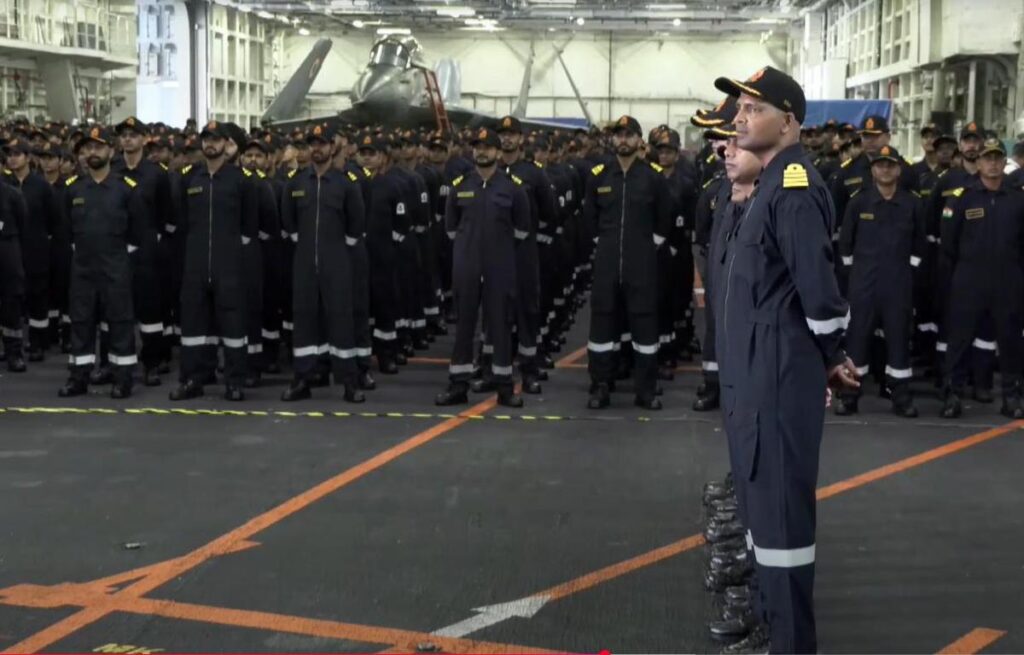 Indian Navy personnel listen to Prime Minister Narendra Modi's address during Diwali celebration aboard INS Vikrant (PC: PMO)