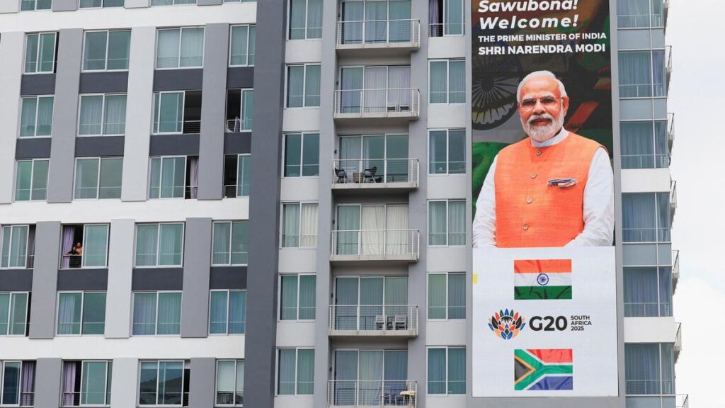A poster of Prime Minister Narendra Modi ahead of the G20 Summit, in Johannesburg, South Africa, November 20, 2025. (Photo Credit: Reuters)