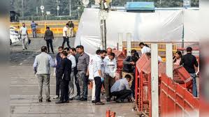 Security personnel inspect the site of the car blast near Red Fort Metro Station, Delhi. Investigators say the suspects had earlier planned a Diwali strike. (Photo: PTI)