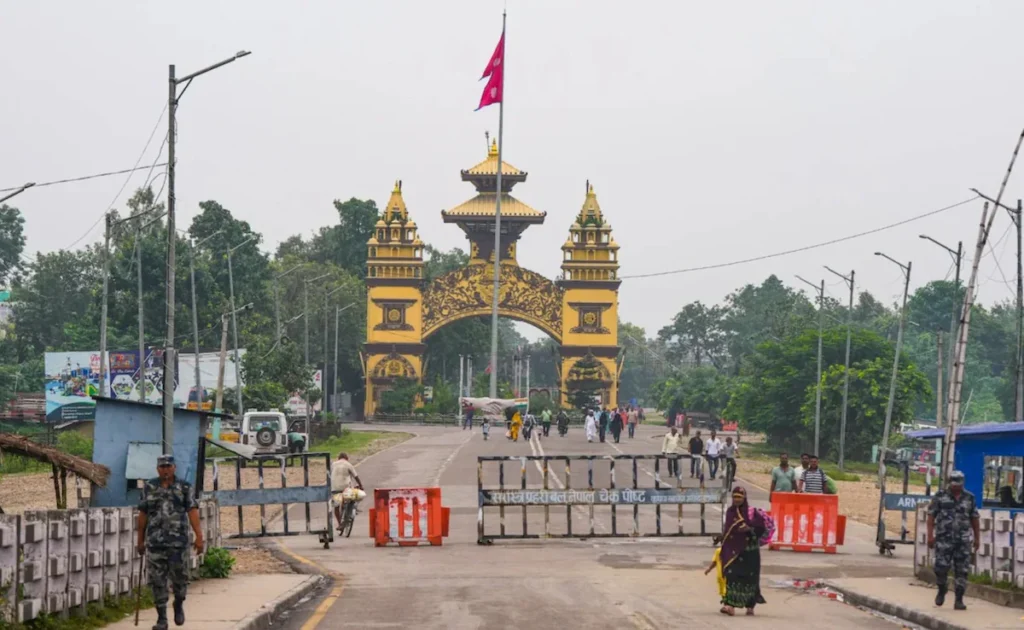 Voters stand in line outside a polling station in Nepal during the country’s first national election following the youth-led protests that reshaped its political landscape. (PC: NDTV)